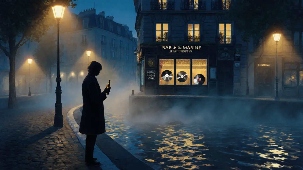 A lone person by Canal Saint-Martin at night, holding wine as reflections shimmer on the water.