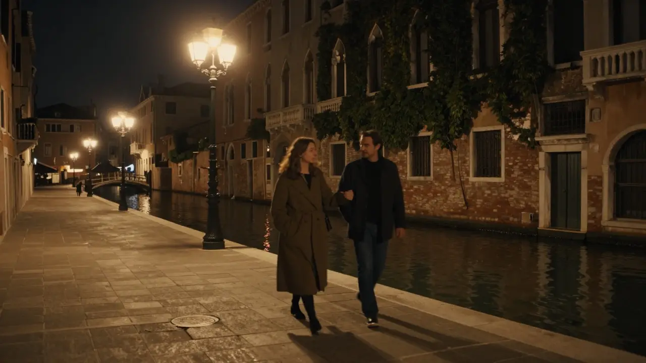 A man and woman walk peacefully along the Navigli canals under vintage streetlamps at night.