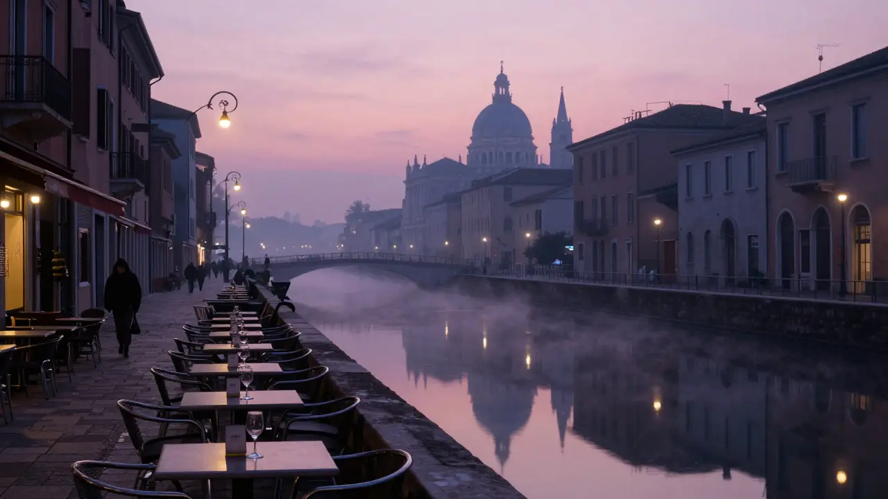 Quiet Navigli canals at dawn with mist, empty bars, and soft morning light reflecting on water.